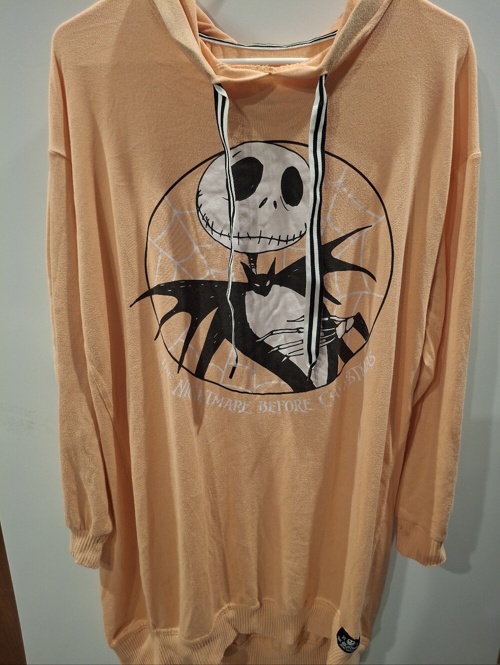 Disney Women’s Crewneck Sweater in Peach with Jack Skellington Graphic